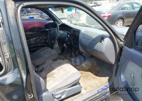 1999 Toyota Tacoma from USA, damaged, VIN 4TAVL52N2XZ472334